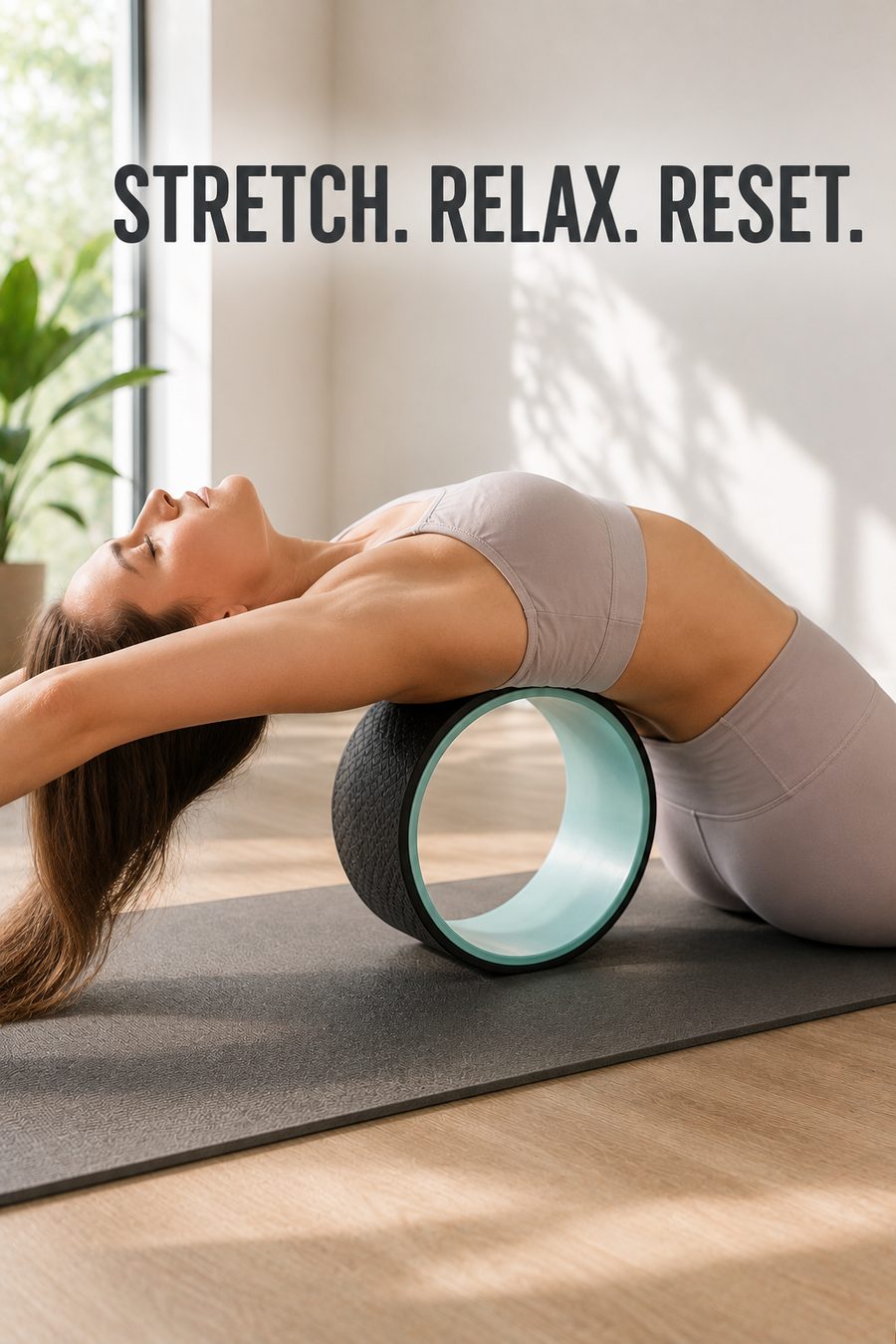 Woman stretching over a yoga wheel on a mat in a bright, calm home wellness space.